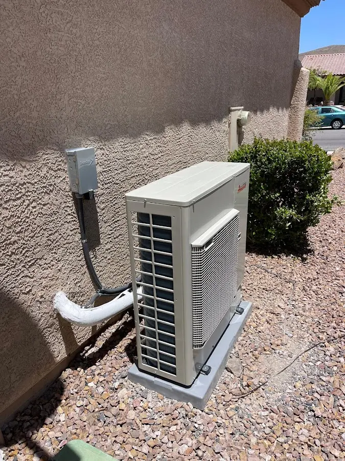 Residential air conditioning condenser unit in Lemoore